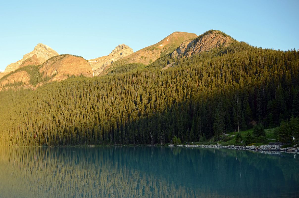 01 Lake Agnes Trail Contours Through The Trees To The Lake Just To The Right Of The Big Beehive With Mount Whyte, Mount Niblock and Mount St Piran Early Morning